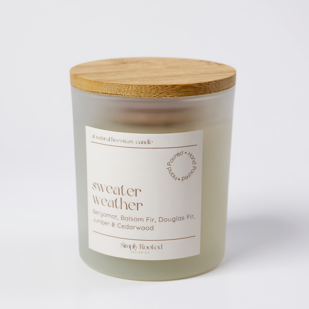 10 oz beeswax candle with wooden lid labeled 'sweater weather' on a white background